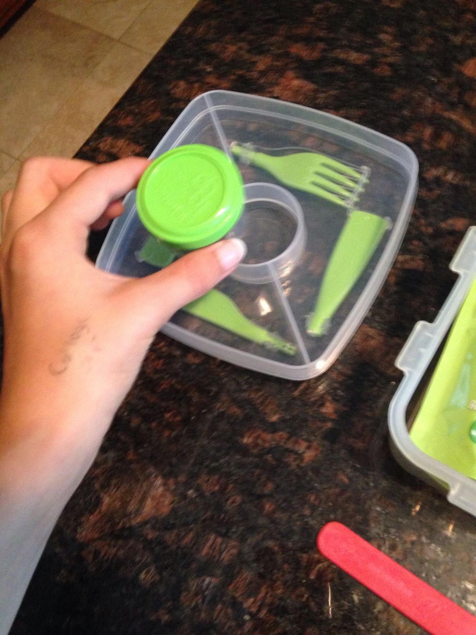 Place small cup in the top of the container