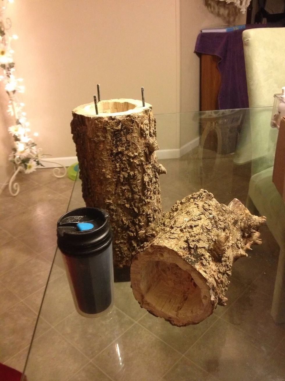 Place small rubber caps on top of the rods. This is a side view of the log with the container it was built for.