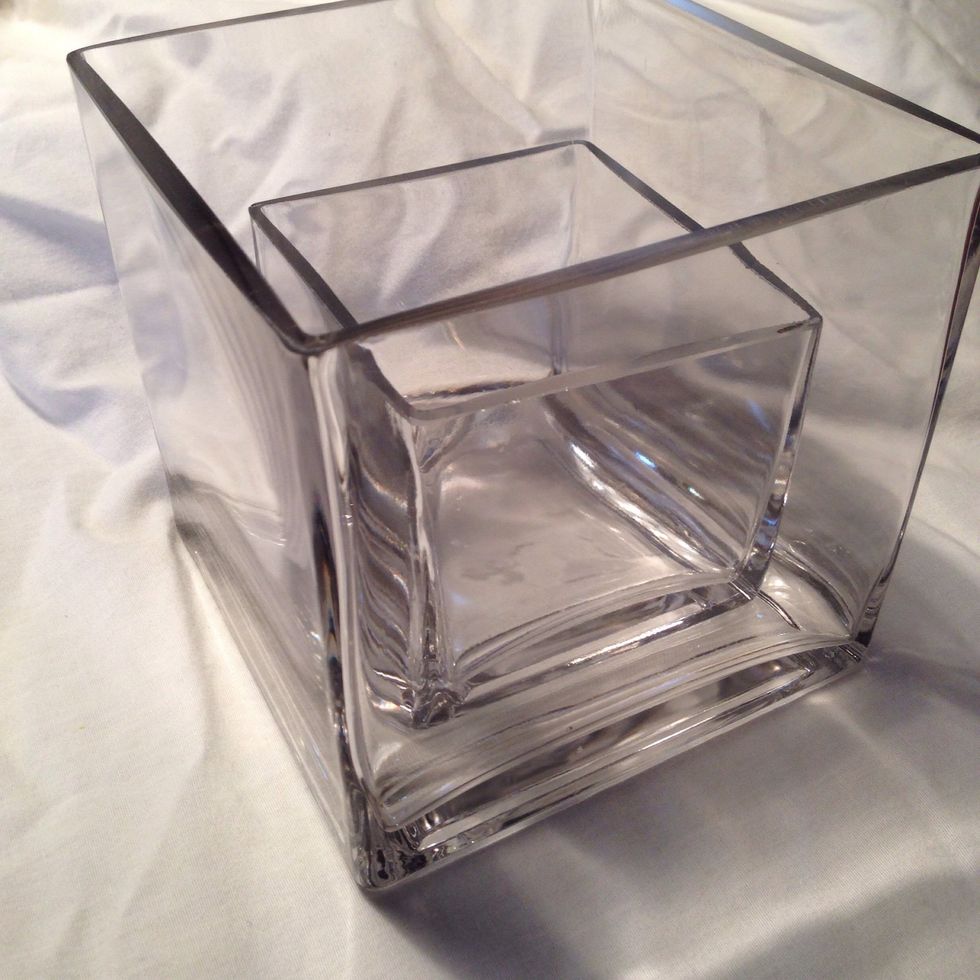 Place small square vase inside large square vase. Vases may need to be washed before use depending on where you got them .