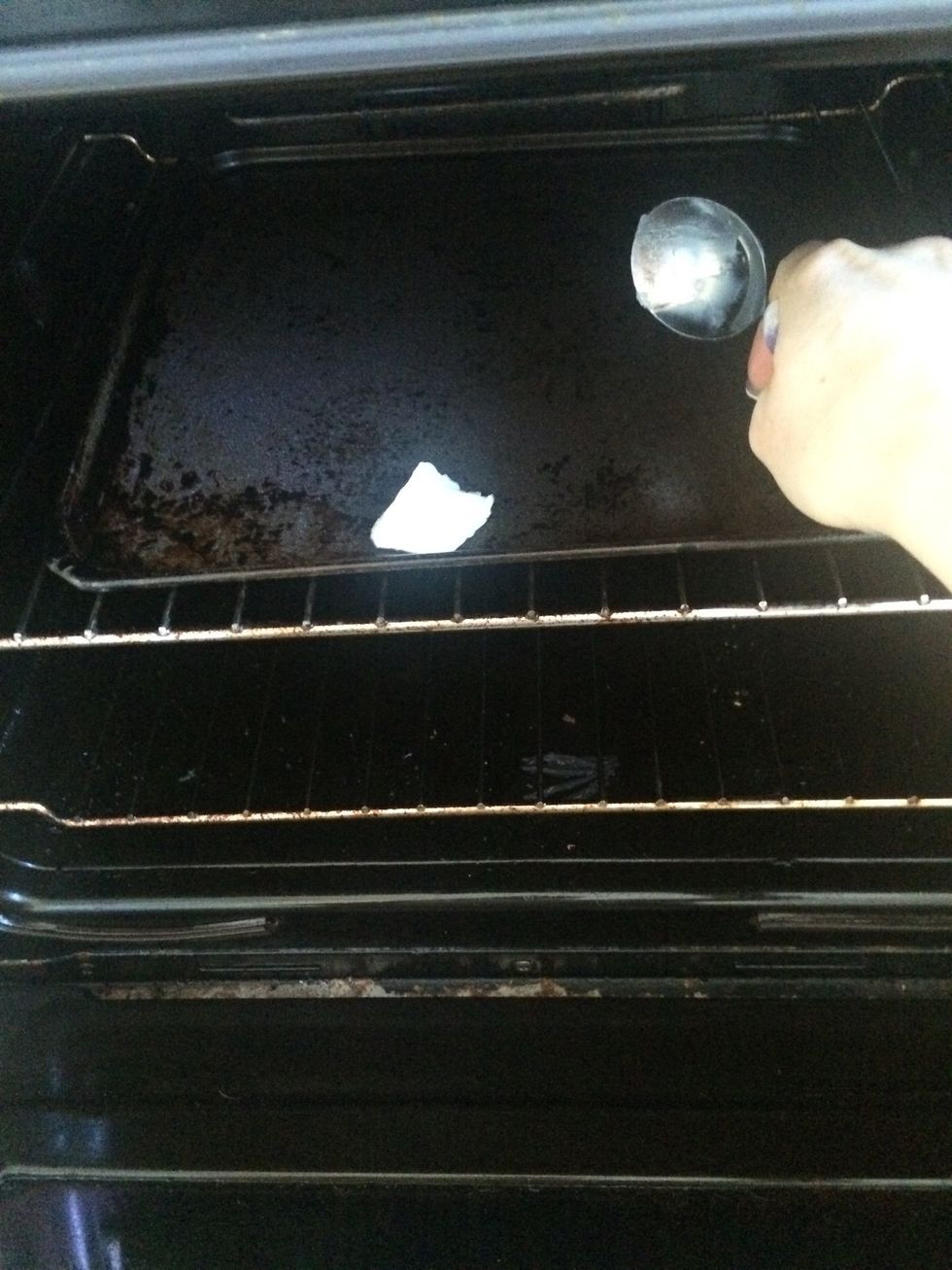 Place some coconut oil on hot oven tray