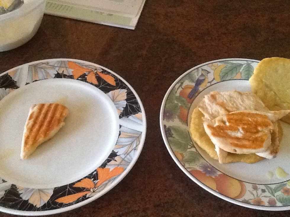 Place some of the meat into the 2 pieces of bread like substances