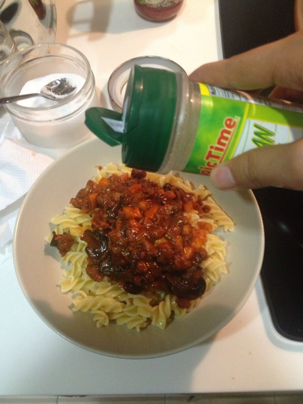 Place some of the sauce on top and sprinkle some Parmesan.