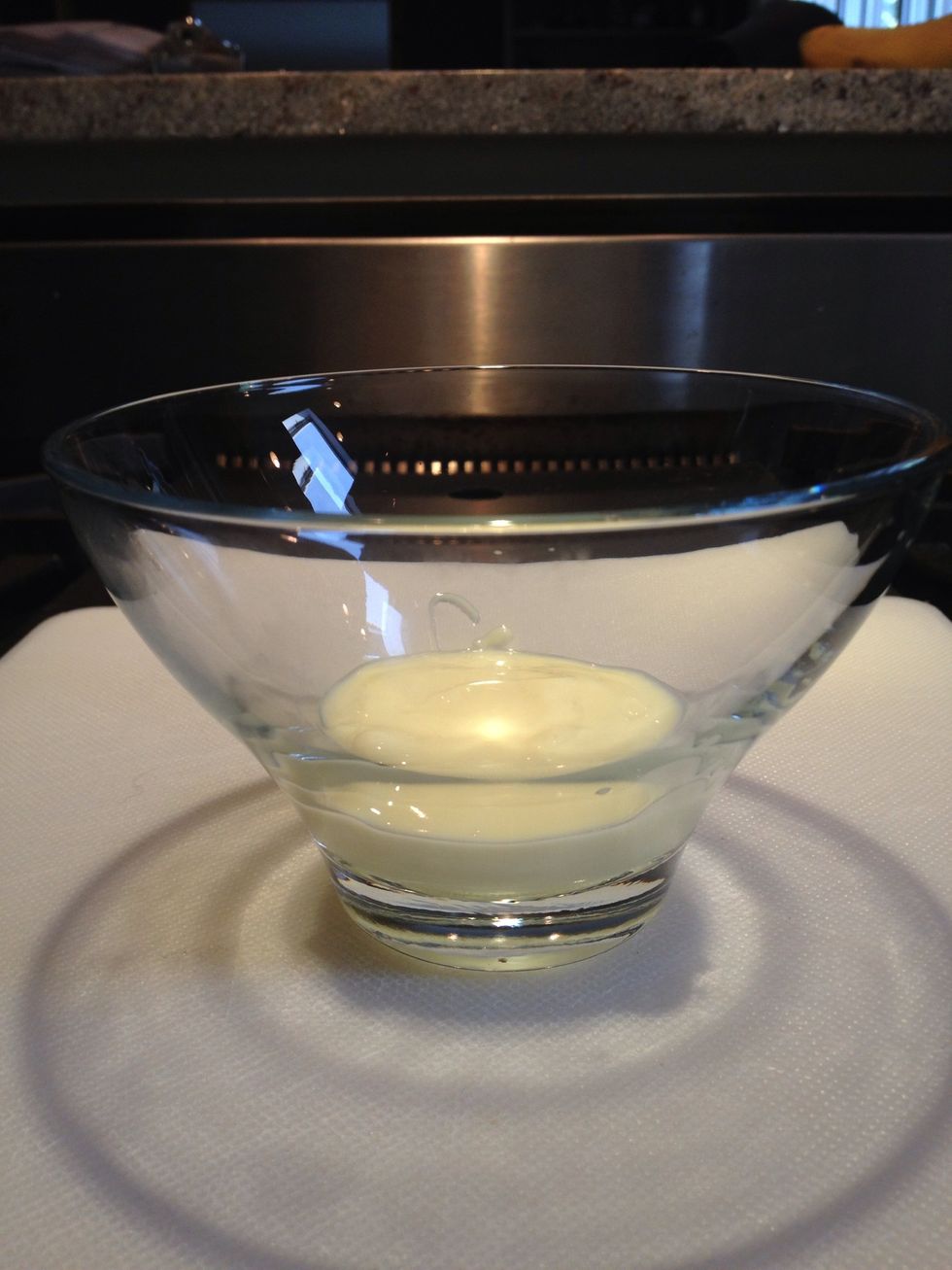 Place some yogurt in the bottom of the bowl