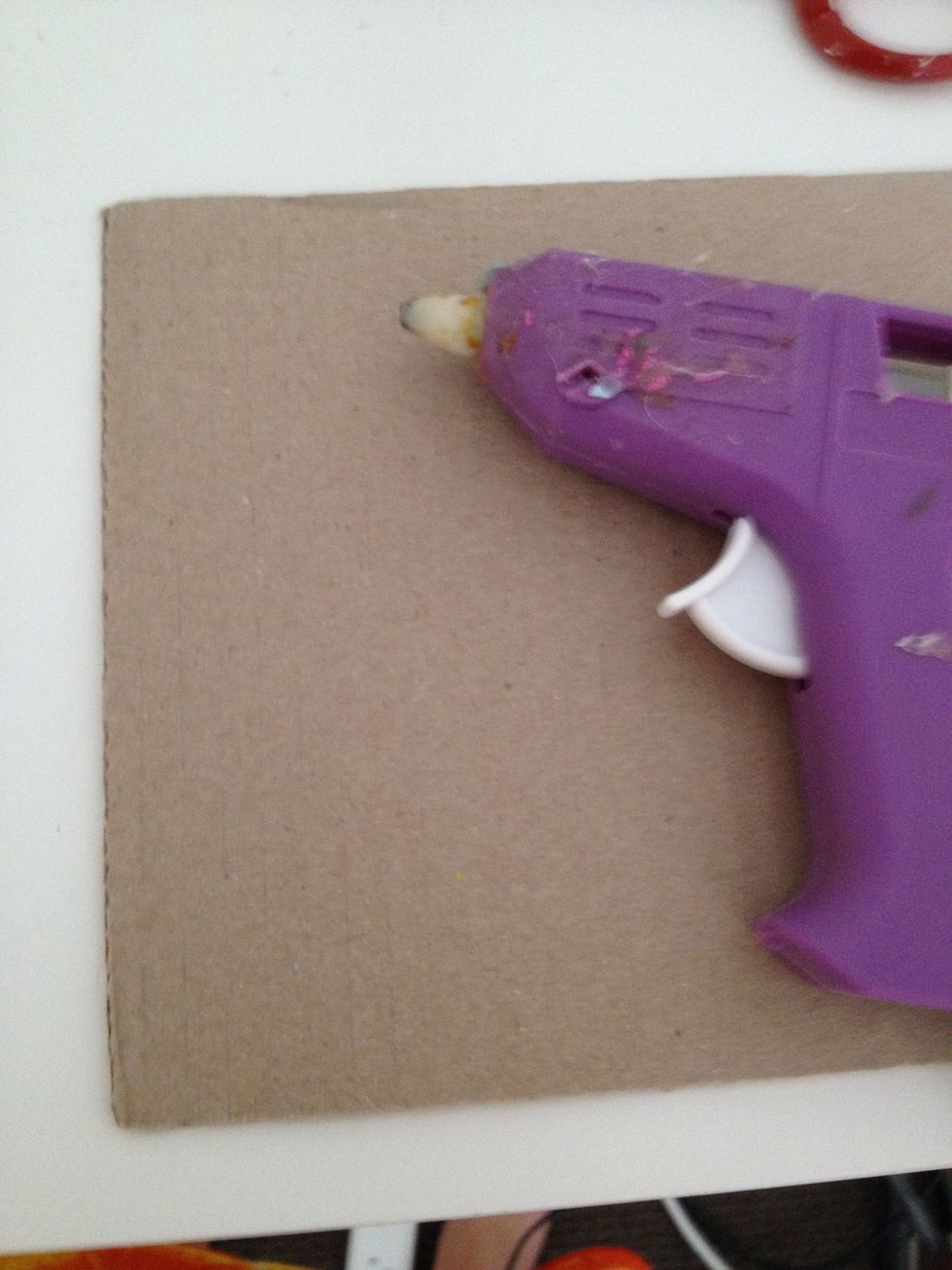 place something down the protect your area and warm up your hot glue gun.