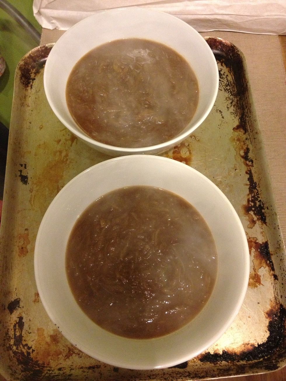 Place soup into warmed bowls