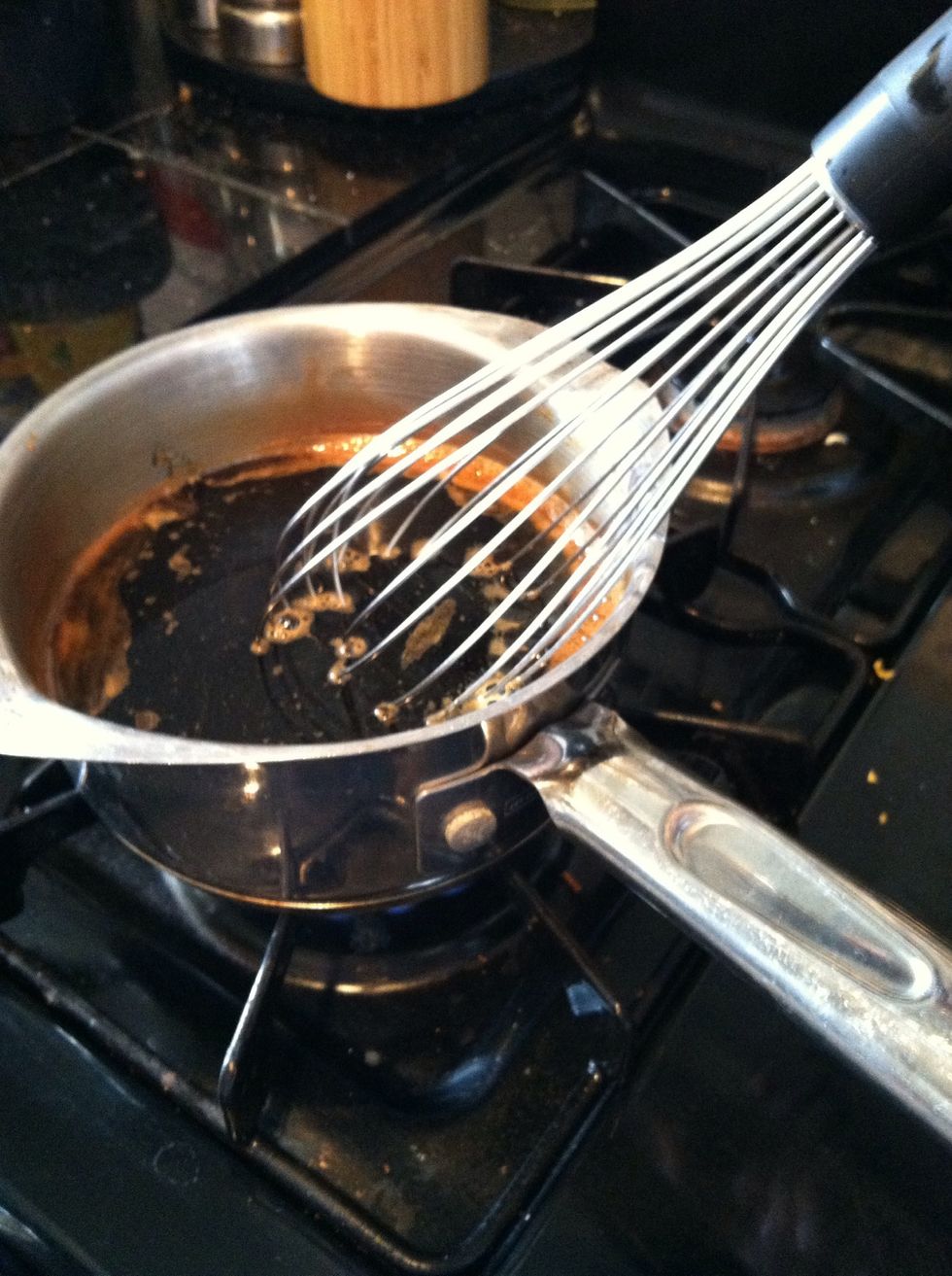 Place soy sauce and sugar in saucepan on med low till sugar dissolves.
