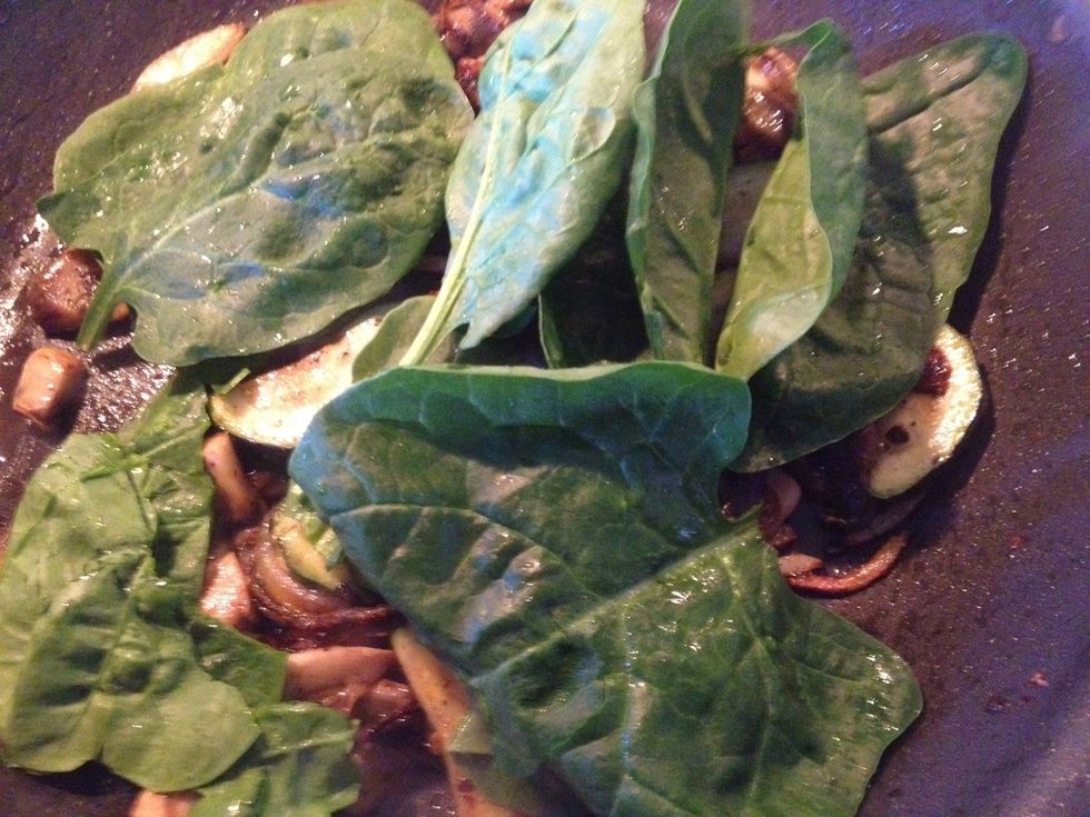 Place spinach leaves in skillet. Gently fold into mix until kinda wilted.