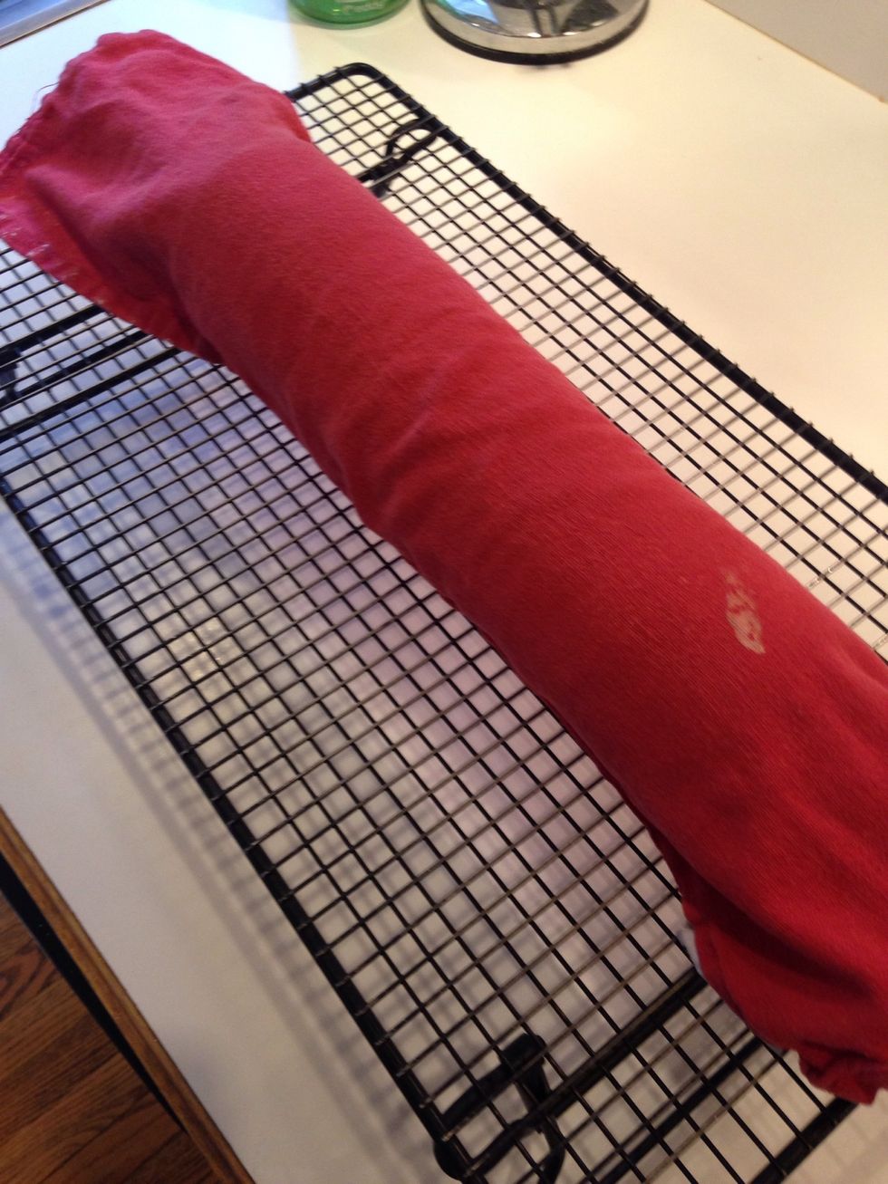 Place sponge seam side down on s cooling rack for a couple hours until completely cooled, or overnight.