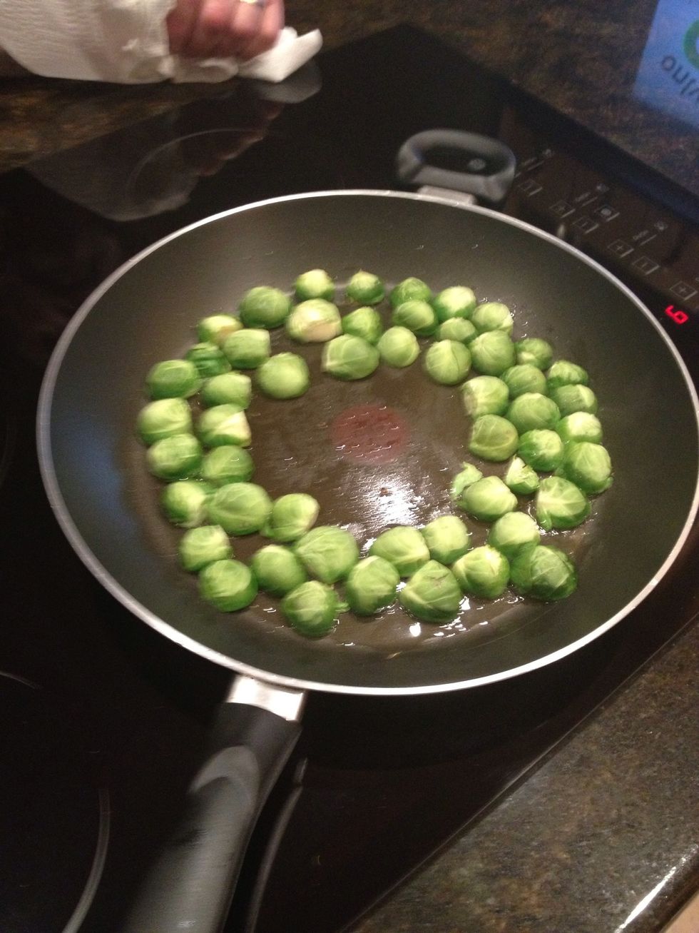 Place sprouts face down and cook until under side is golden brown, then flip and let cook another 5 minutes.