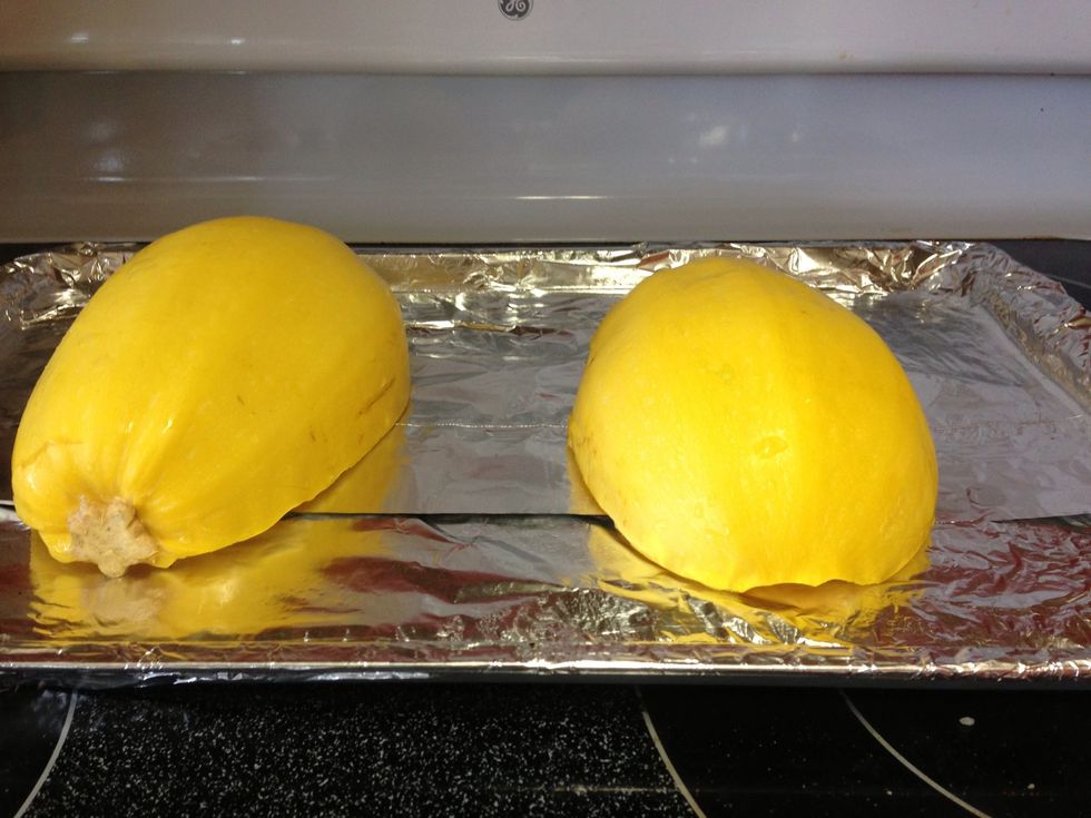 Place squash cut side down onto pan