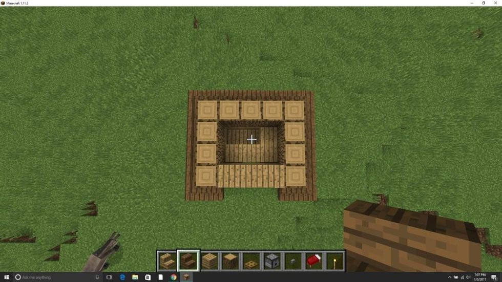 Place stairs on all sides except for the 3 middle in the front (the stairs should be a different kind of wood then the logs and the other stairs).