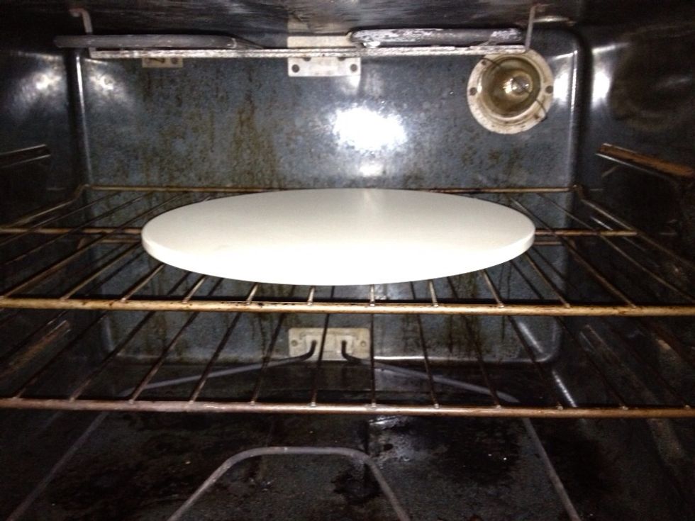 Place stone on 2nd rack position from the top  ~about 5" from broiler and preheat stone for an hour.