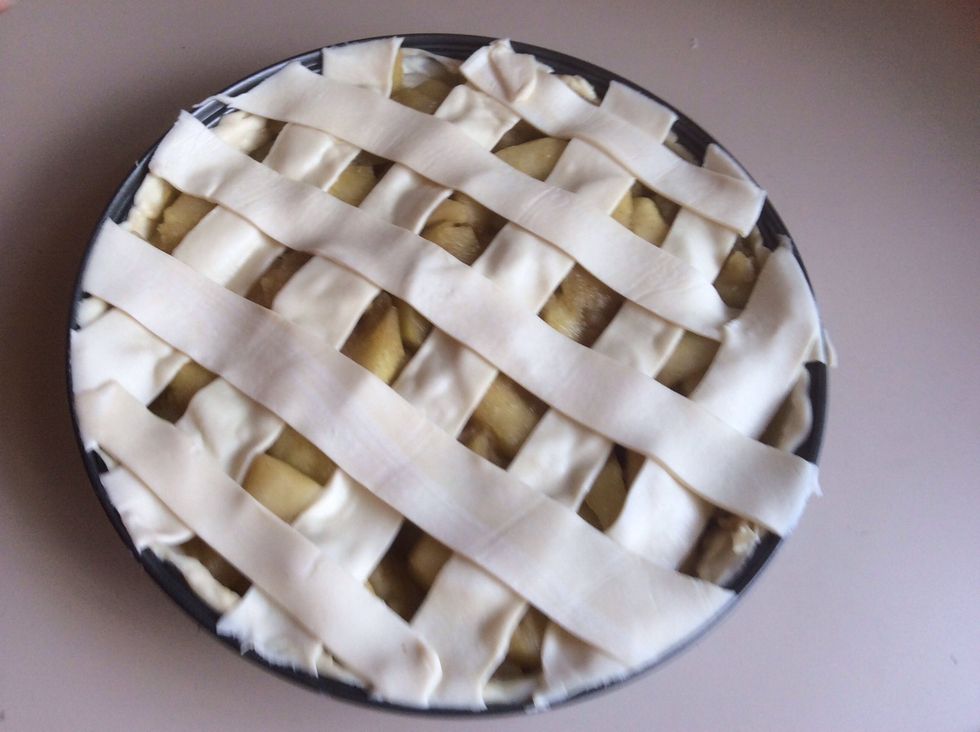 Place strips of pastry over the top like so.