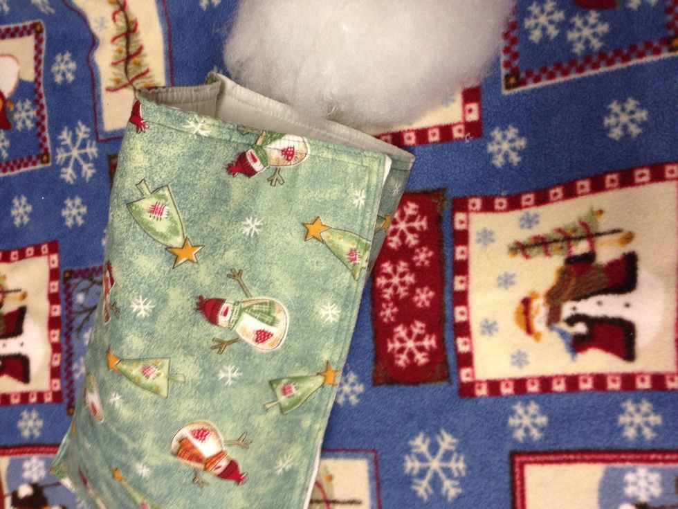 Place stuffing in the pillow through the opening.