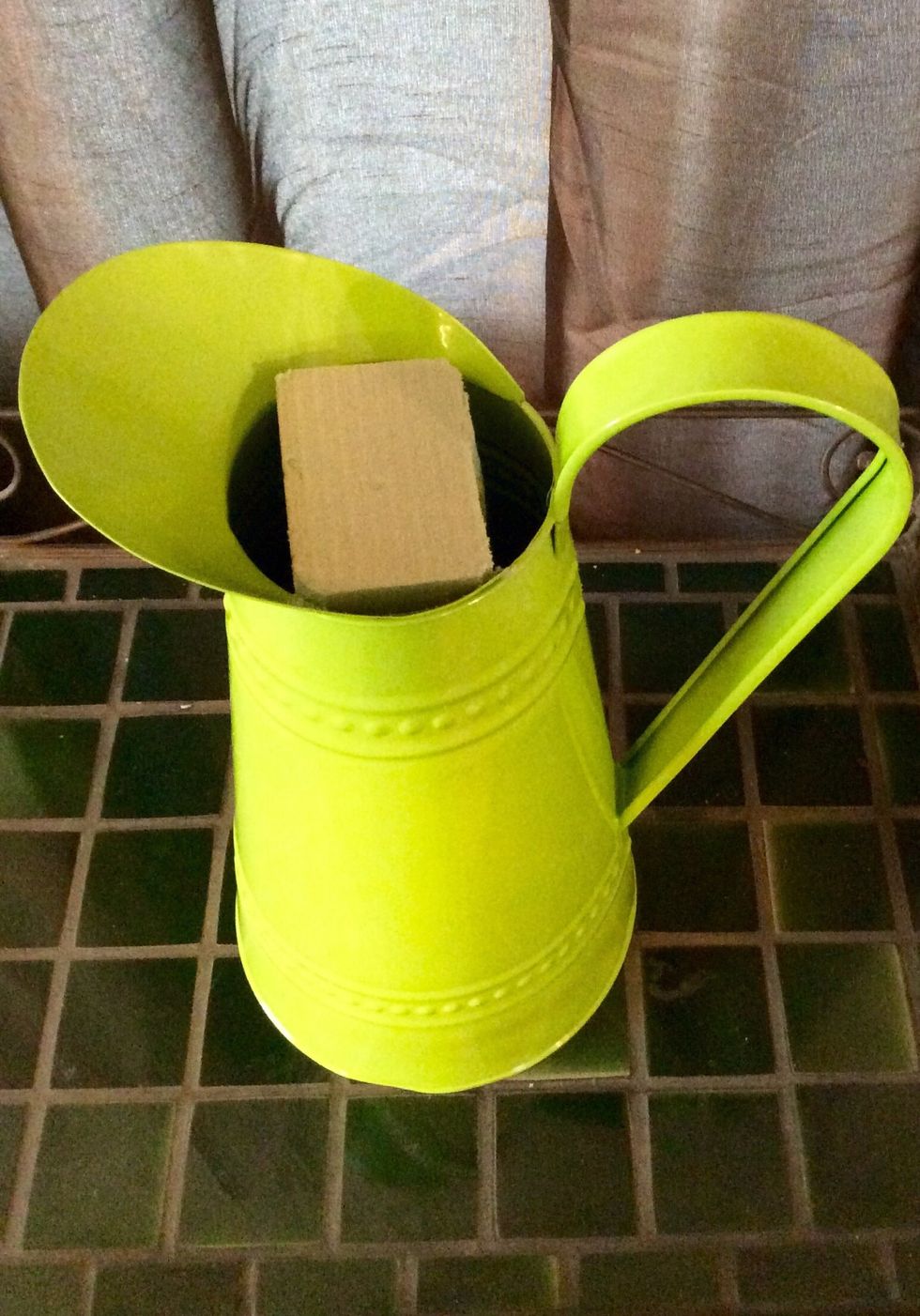 Place styrofoam into the container that will be housing your bouquet. You may need to cut the styrofoam to make it fit.