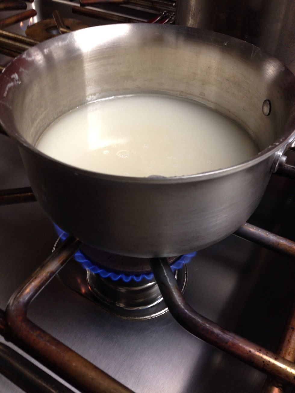 Place sugar and water over medium flame.