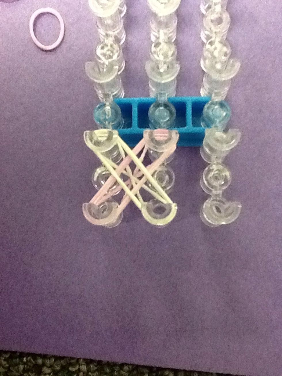 Place that band on the loom.