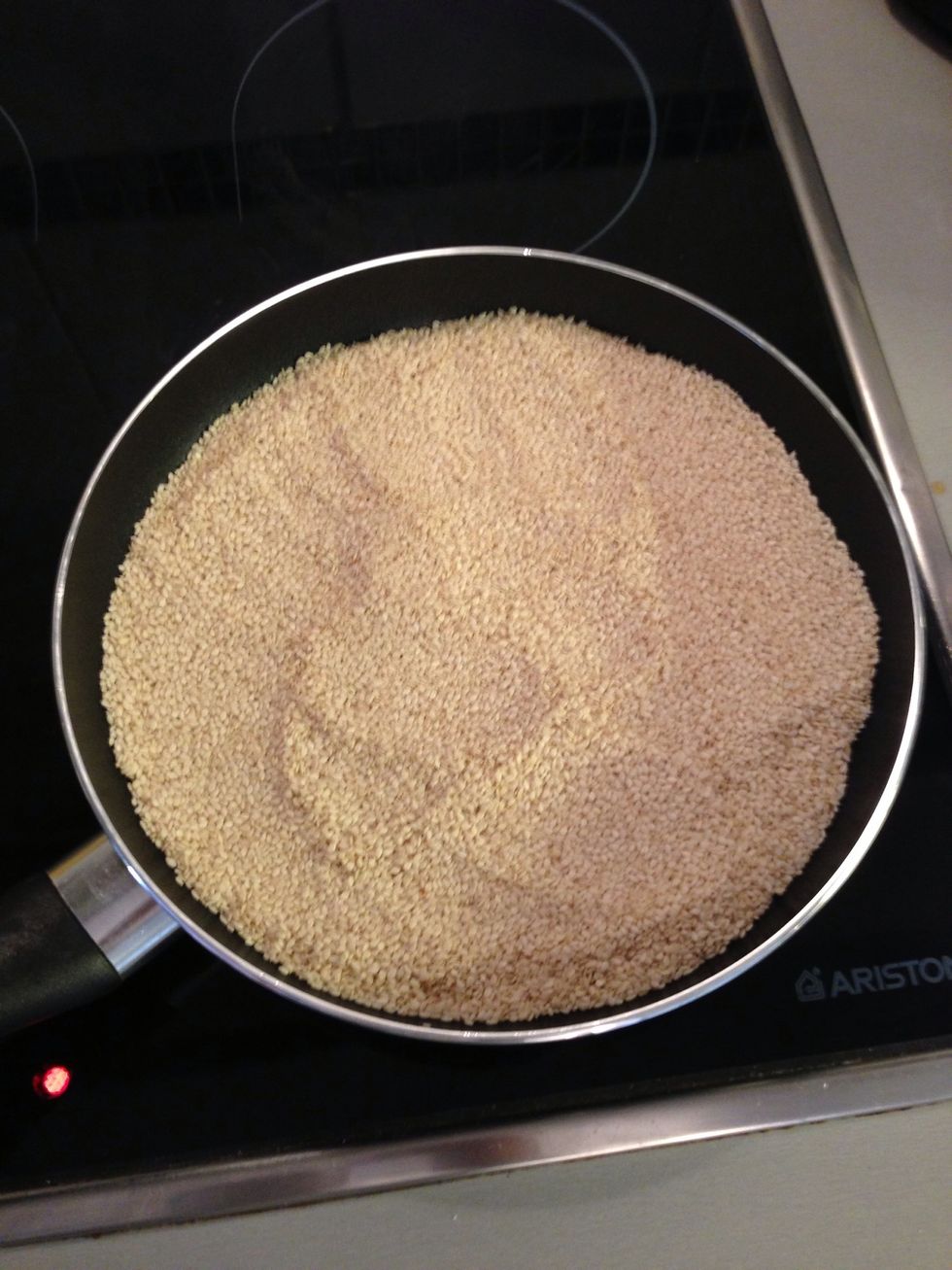 Place the 500g in a pan and lightly roast for 10-15 mins - allow seeds to go golden. Do not burn. This can be done under a grill - but keep and eye on them. NB/ a big pan is required
