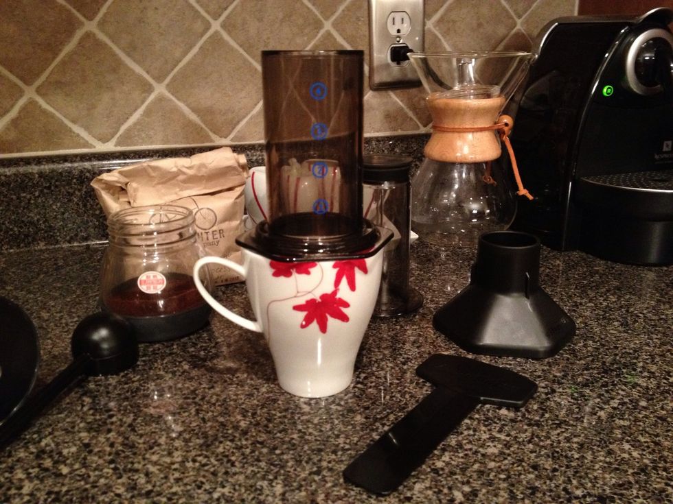 Place the assembled chamber over your favorite coffee mug. If you're using a travel mug you can use the funnel under the chamber to taper down if need be.