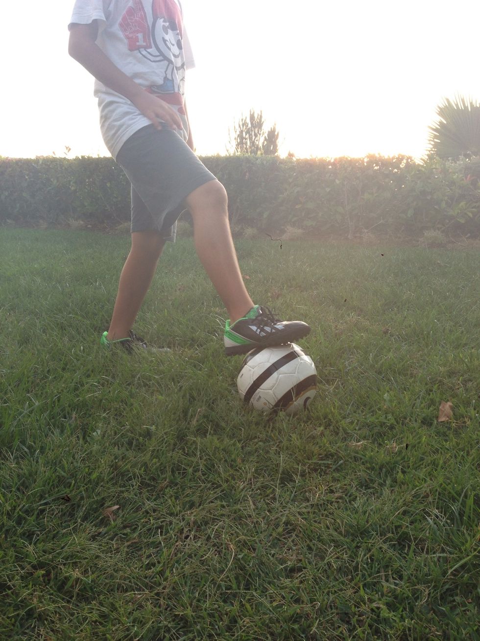 Place the ball on the ground.