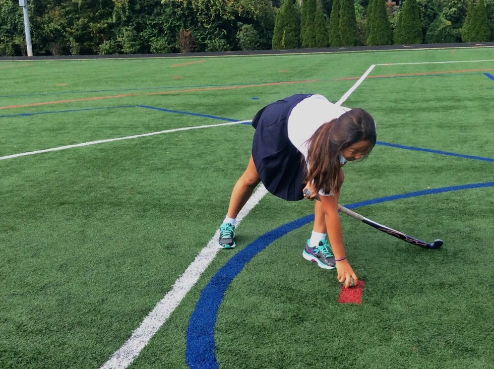 Place the ball on the red dash.