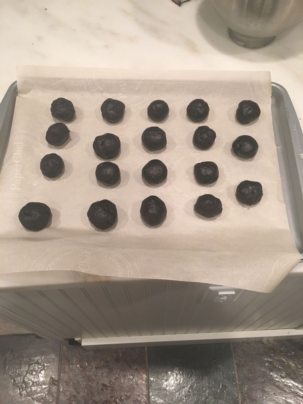 Place the balls of dough onto the wax paper on your tray.