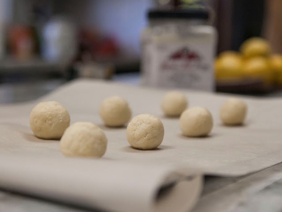 Place the balls on a cookie sheet covered with parchment paper.