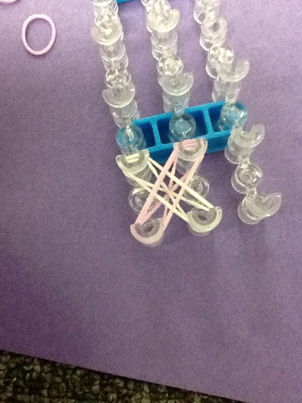 Place the band on loom.