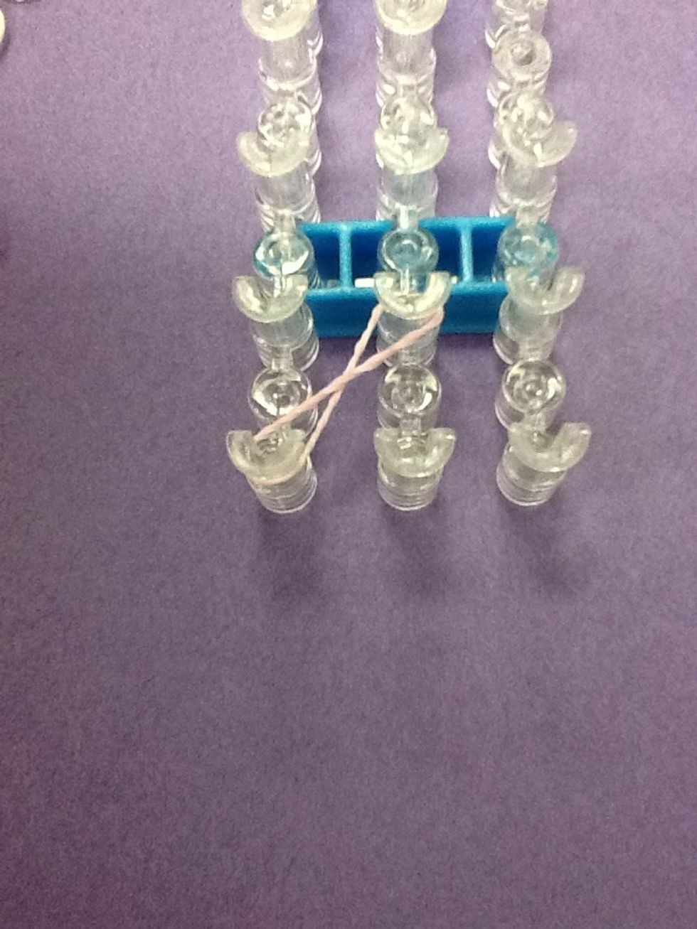 Place the band on the loom diagonally.