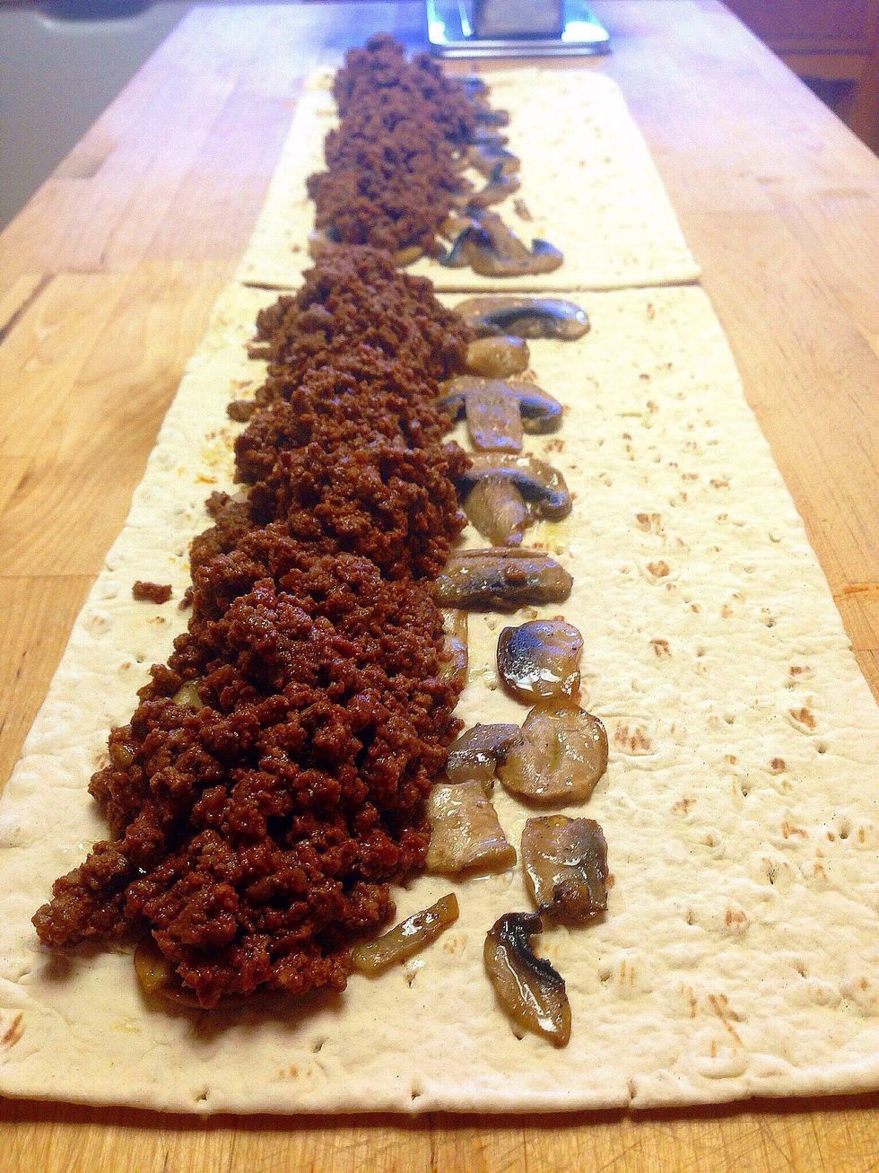 Place the beef closer to one side of bread. This way will be easier to roll