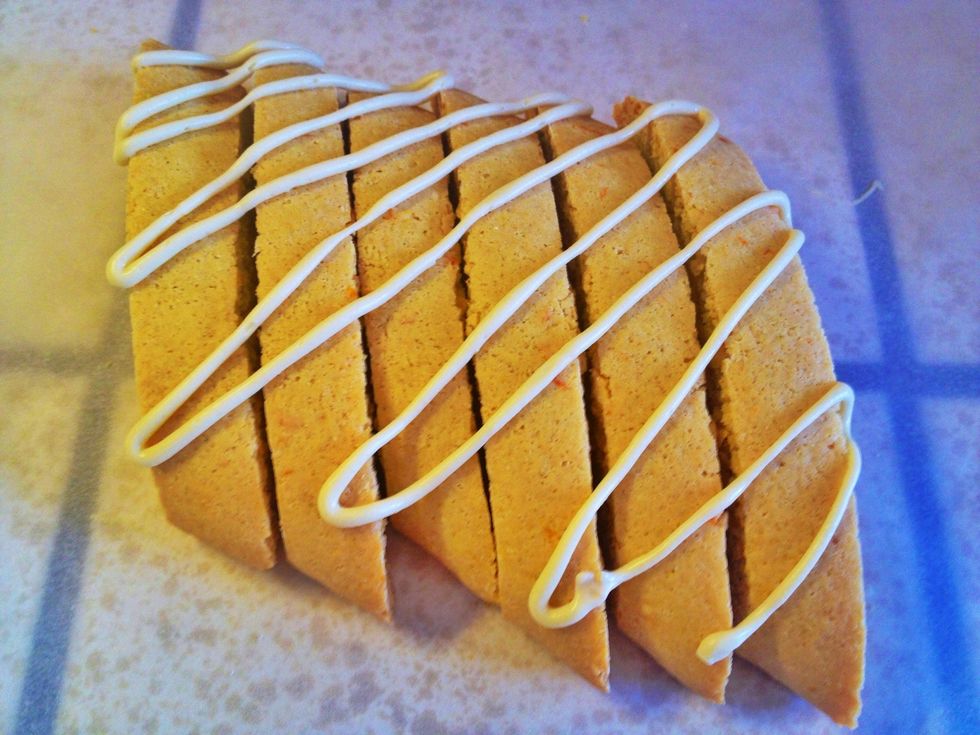 Place the biscottis right next to each other. Drizzle and decorate over cooled biscottis.