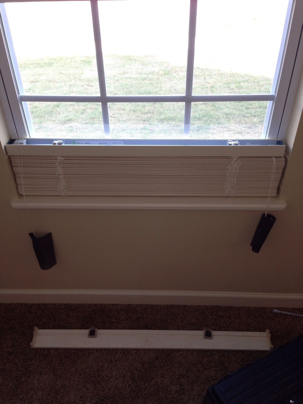 Place the blind in the window and attach your valence clips to the valence.