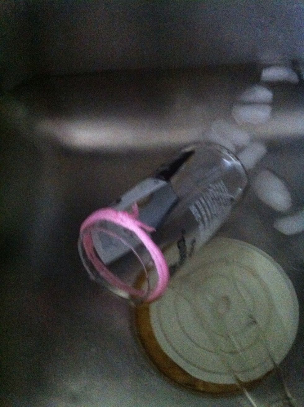 Place the bottle gently in the sink, and it will automatically crack.