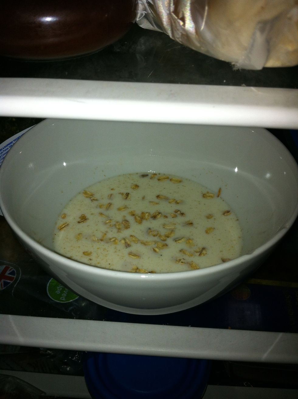 place the bowl in the fridge, allow the oats to soak in milk overnight.