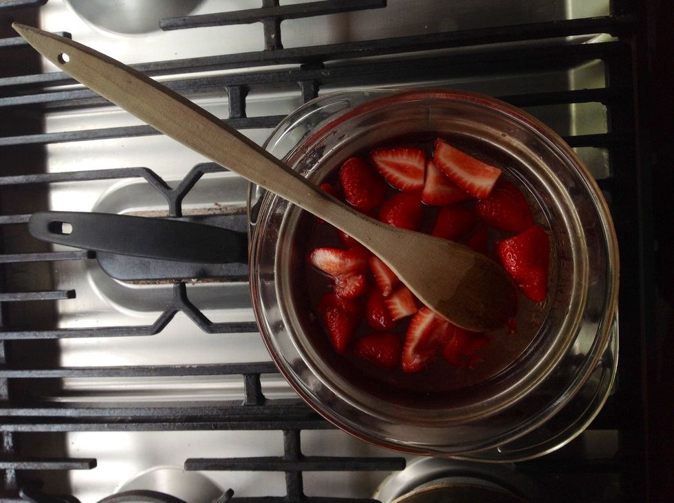 Place the bowl over a saucepan of simmering water for 5 minutes, stirring occasionally.