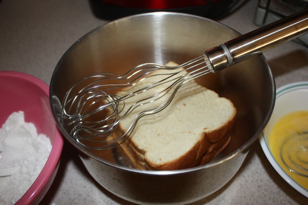 Place the bread in a bowl. Just plain ole white or wheat soft cheap bread. Stale bread will also work.