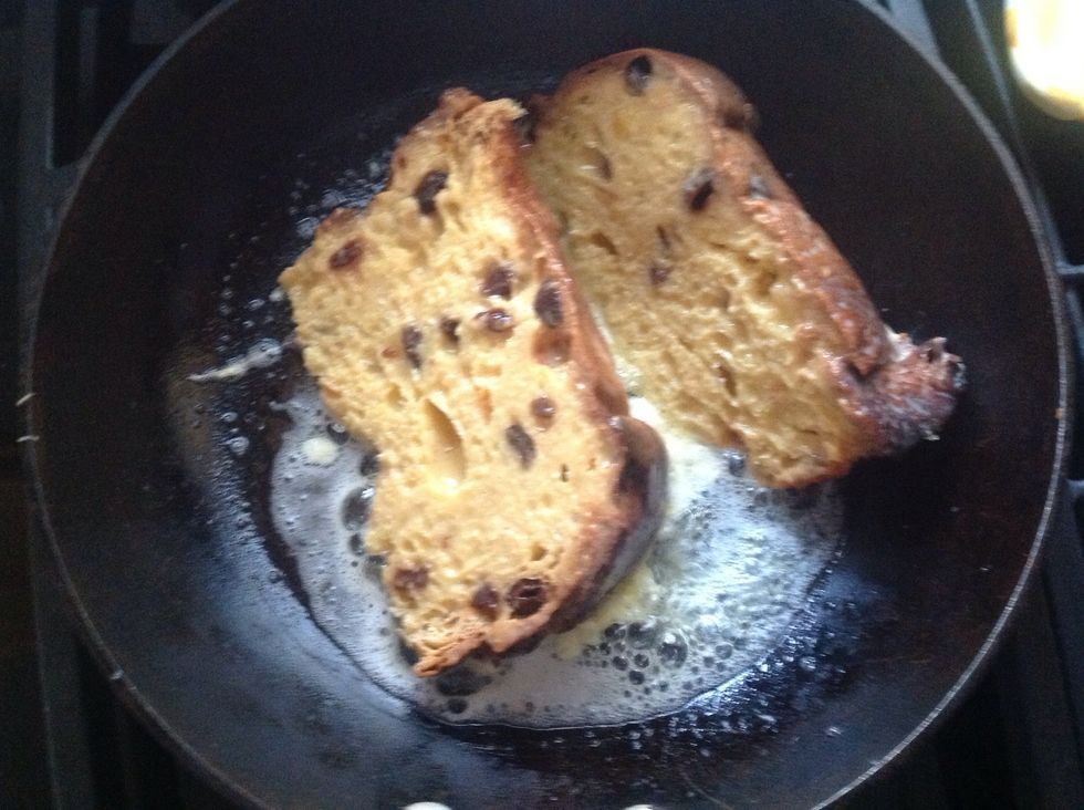 Place the bread in the pan and cook until golden brown on all sides.
