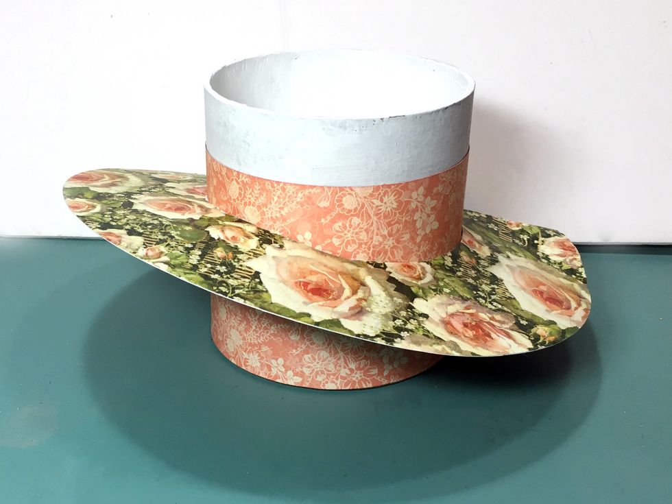 Place the brim back on the box and press into place all along the top edge of the foam tape. Allow the glue to dry.