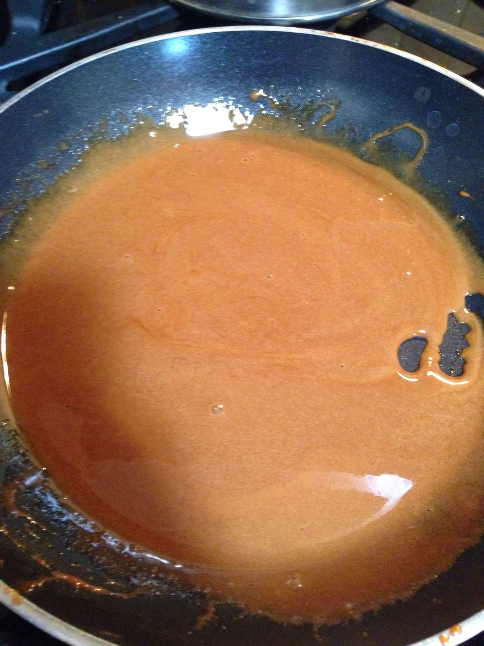 Place the brown sugar on a pan on low heat until it turns into a light colored smooth caramel. BE CAREFUL TO NOT BURN THE CARAMEL. TURN DOWN THE HEAT IF IT STARTS TURNING DARKER IN SOME AREAS