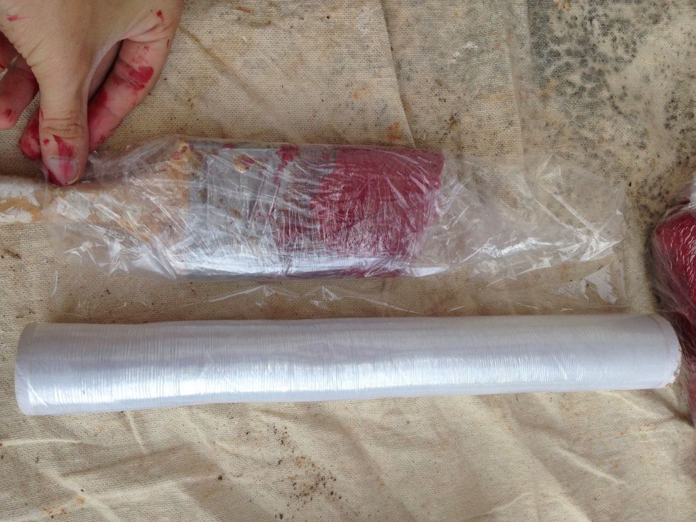 Place the brush about halfway up and begin wrapping. Wrap it 3-4 times and then lightly press on all sides. Finally just fold the excess down.