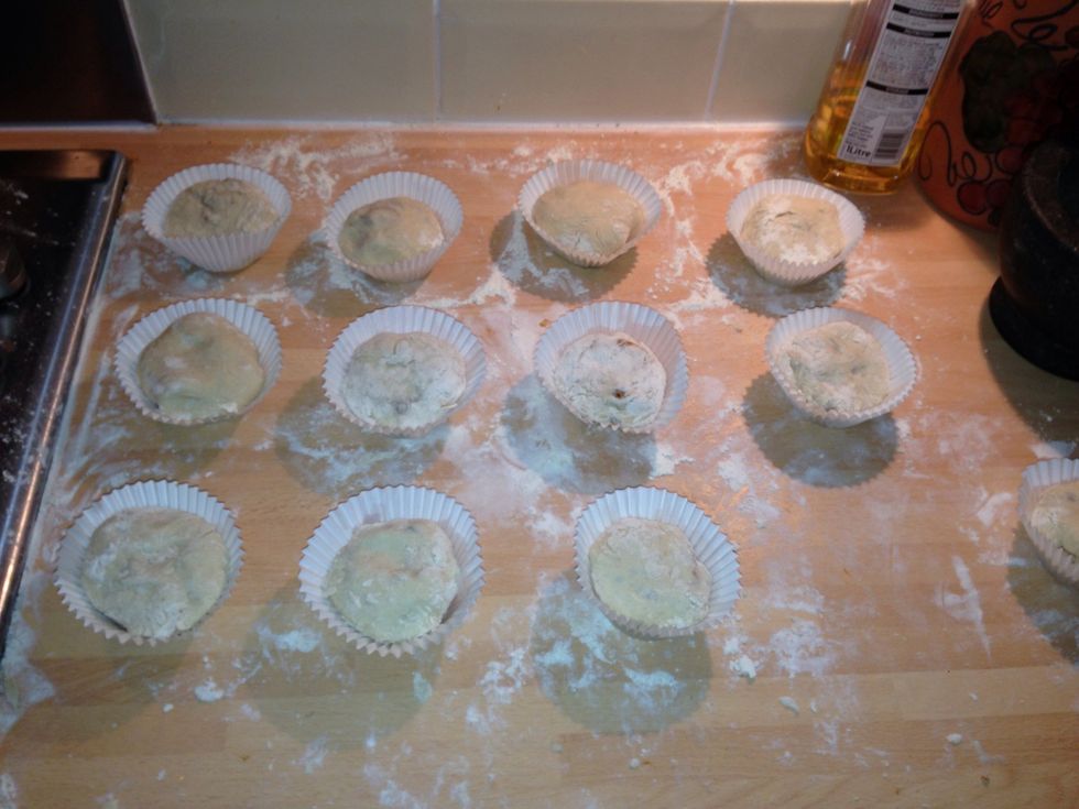 Place the buns with the side you've just pinched together to seal face DOWN in the cupcake wrappers. Smooth side up \ud83d\udc45