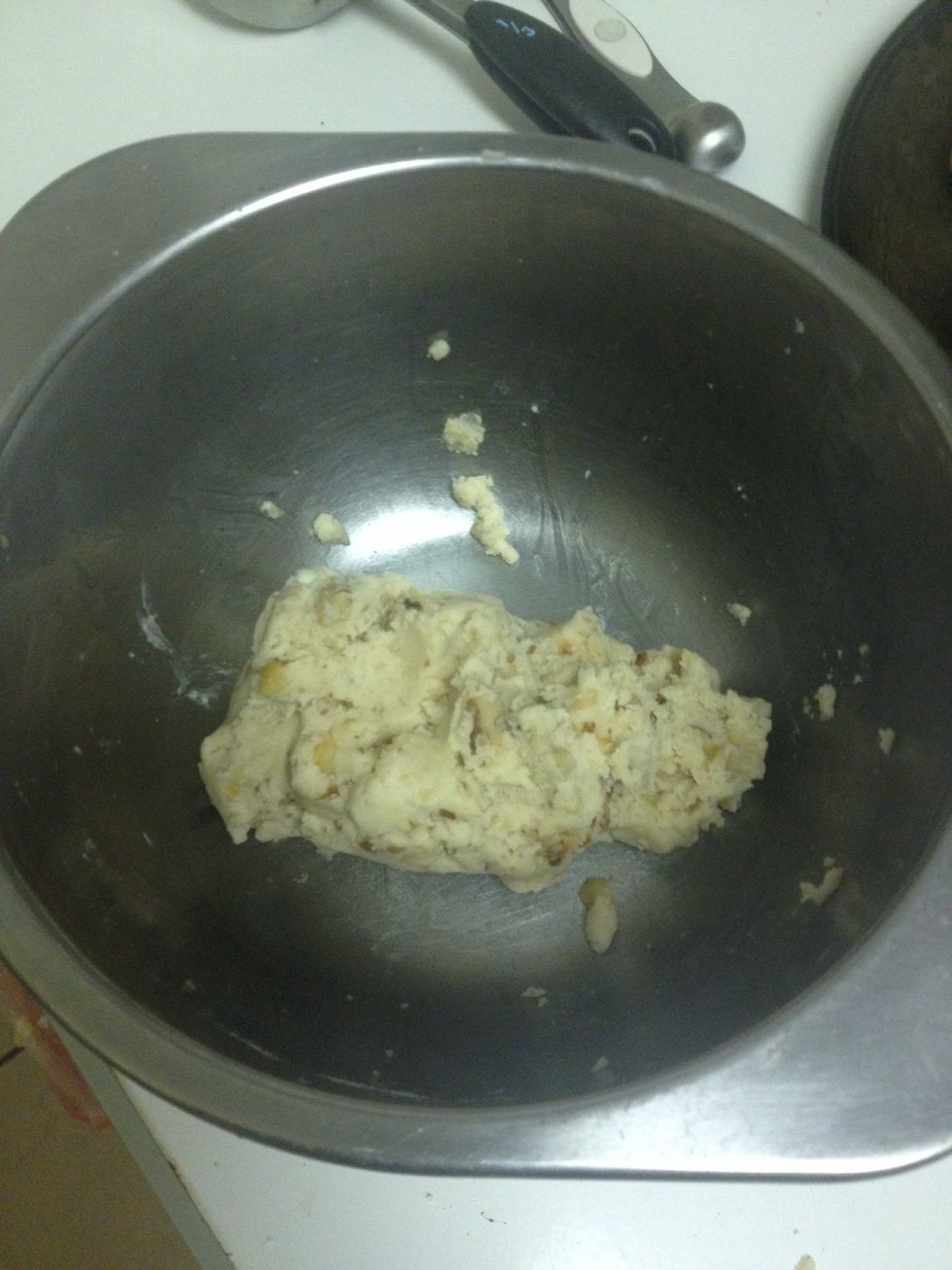 Place the butter into your mix now with your hands combined the ingredients thoroughly.