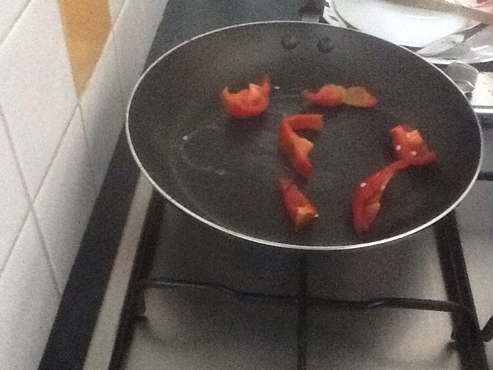Place the capsicum onto the pan.