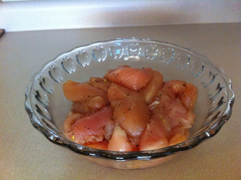 Place the chicken in a bowl and season to taste.