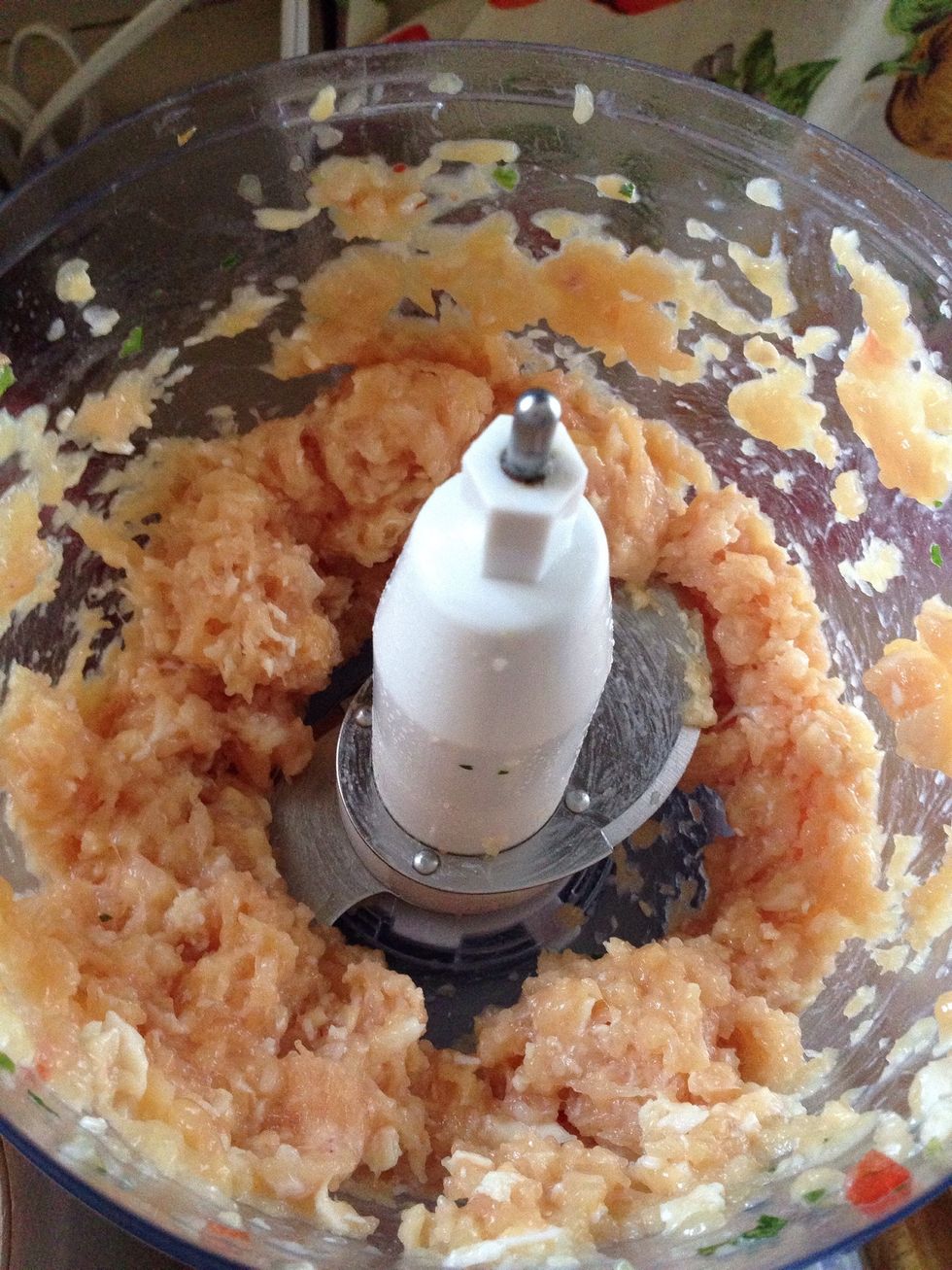 Place the chicken in the food processor and pulse until you get to this consistency.