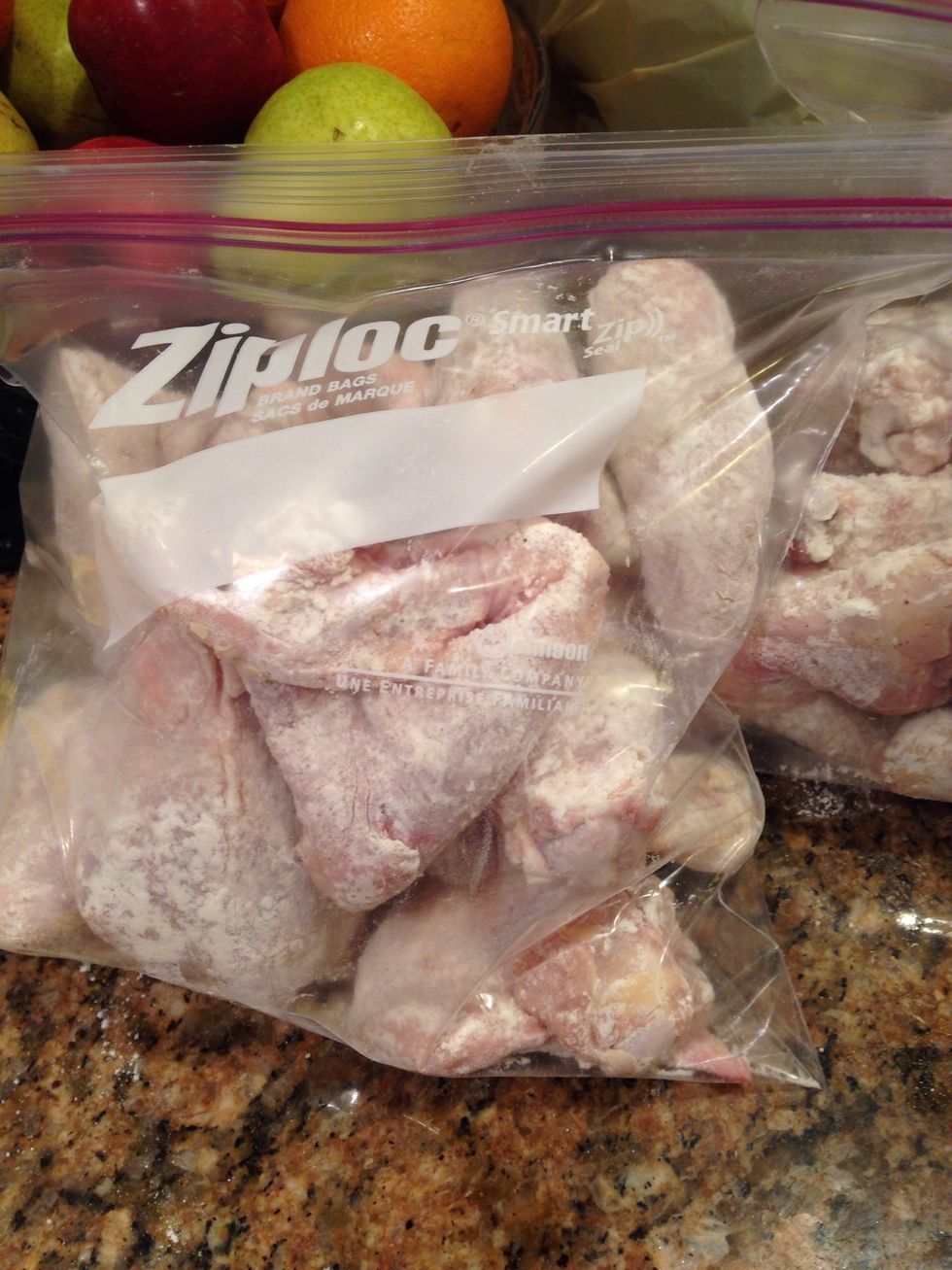 Place the chicken, in this case drums and wings, in freezer bags and let sit in the fridge overnight. You could do thighs or breasts too.