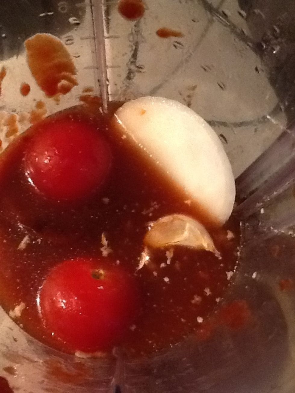 Place the chipotles chiles,garlic,onions,salt, a little water