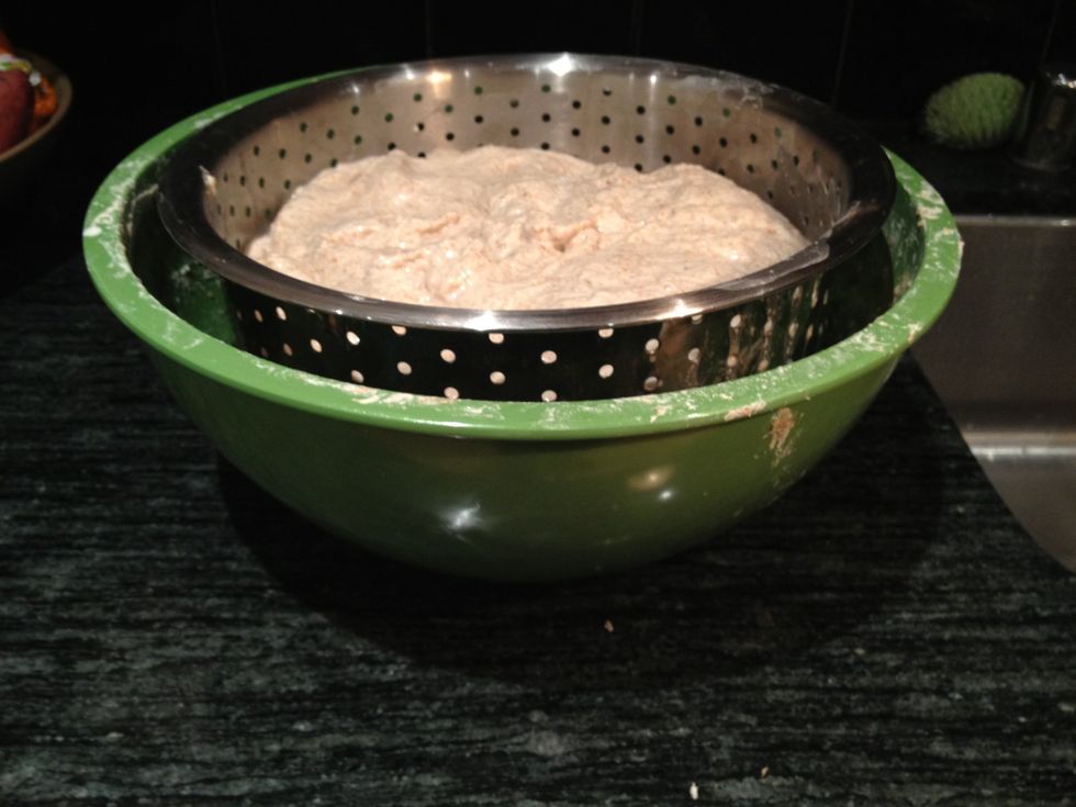 Place the colander into the large, empty bowl. This is what it should look like.