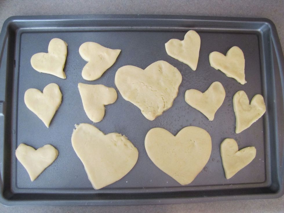 Place the cookies on a cookie sheet. Try to keep them at least an inch apart because they'll expand in the oven.