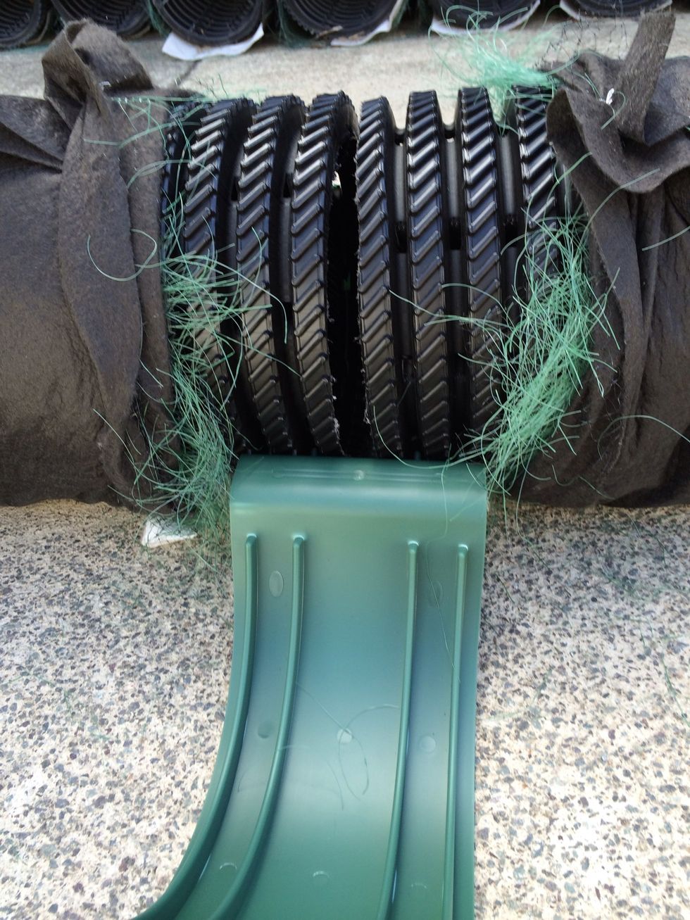 Place the coupling so that the 2 ribs engage on the end of each AES pipe.